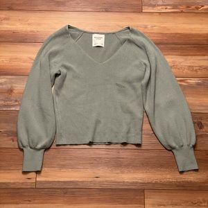 Light blue, bell sleeved shirt